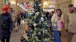 The exhibition with designed decorated Christmas trees from different boutiques of GUM, Moscow,  Russia