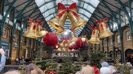 Crowds descend on London’s iconic Covent Garden ahead of Christmas