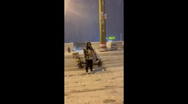 Dedicated Delivery Rider Continues Working in Extremely Heavy Snowfall in Northern China