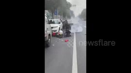 Chaotic scene as car plows through pedestrians and collides with parked vehicles in China