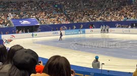 Canadian athlete's agile maneuvering amidst collision in short track speed skating World Cup final