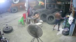 Car tire explodes while being inflates in repair shop