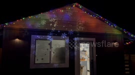 Snowflake Spectacular: Big Bear City Neighborhood Transformed by Enchanting House with Projected Snowflakes!