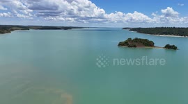 Lagoa Juparanã is a lagoon located between the municipalities of Linhares, Rio Bananal and Sooretama, in the state of Espírito Santo, Brazil. It is one of the largest lakes in the country in terms of freshwater volume. The main access is via km 137 of BR-