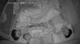 Baby resorts to hilarious strategy to stop dad's snoring - by slapping him in the face