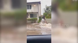 Video shows flash flooding rushing past apartment complex in Santa Barbara
