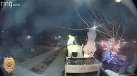Christmas Scrooge pops festive inflatables outside home in Colorado