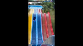 Guy Helps Boy Stuck in the Middle of Water Slide