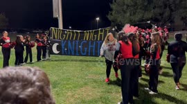 Cheer Coach Gets Knocked Over by Football Team's Playoff Entrance