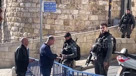 Hundreds of Palestinians gather to perform Friday prayer in Wadi al-Juz neighborhood after Israeli authorities barr.ed them from entering Al-Aqsa Mosque in East Jerusalem