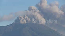 Time-lapse footage of Indonesia volcano erupt, followed by continuous gusts causing ashfall and international airport closures