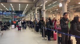 Queues continue to grow at St Pancras as Christmas getaway disruption continues in London, UK