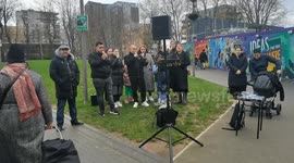 Romanian community singing Romanian Christmas song, Walthamstow, London, UK