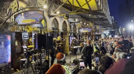 Glen Hansard busks for homelessness charity in Dublin, Ireland