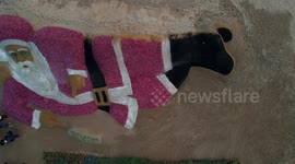 Drone Visuals of world’s largest Santa Claus made of Onion and sand