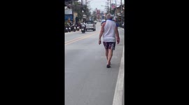 Pirate pensioners walks with parrot on his shoulder