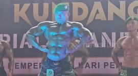 Muscle soldiers take part in a Body Contest Open Tournament in Indonesia