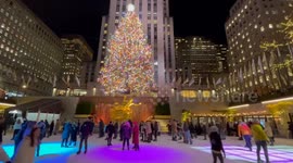 Rockerfeller New York City ice skating at Christmas with Christmas tree