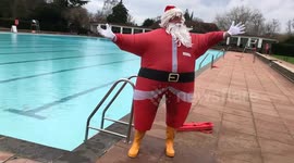Hardy souls take the dip for their Christmas swim