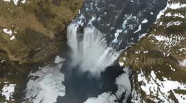 Flight over Skogafoss edge