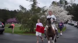 Student, dressed as knight, asks girlfriend to prom on horse and falls off spectacularly