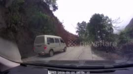Landslide in China caught on dash-cam