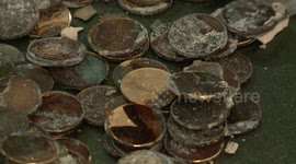 Large number of coins are found in waste bricks