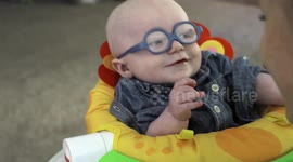 Baby sees his mother clearly for the first time after getting glasses