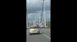 Lorry blown over on English bridge