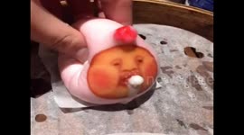 Chinese pastry with cartoon character on it can foam at the mouth