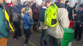 Protest in Iceland over Panama Papers leaks. Kid throws water balloon at Parliament.