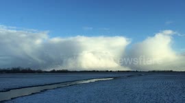 Beautiful, time-lapse of snow storm moving away