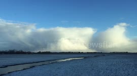 Beautiful, time-lapse of snow storm moving away