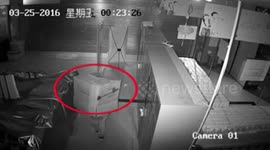 Man puts carton on head to steal in shop