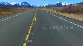 Road heads into beautiful mountains