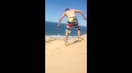 Man sandboards biggest sand dune in South Africa