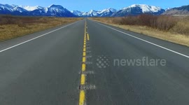 Road heads into beautiful mountains