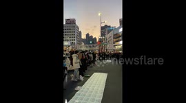 Japan: Pro-Palestine Protesters Gather Outside Tokyo’s Shinjuku Station On Christmas Eve