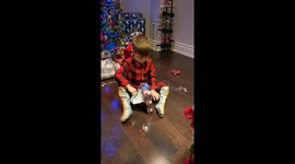 Cute kid thinks Santa buys toys from the Dollar Store instead of making them at the North Pole