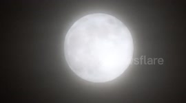 Christmas Cold Moon -  the final full moon of 2023 glowing white over London