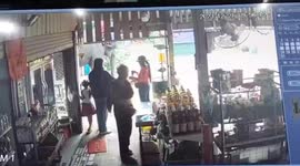 Shocking moment rampaging elephant attacks shopkeeper in Thailand