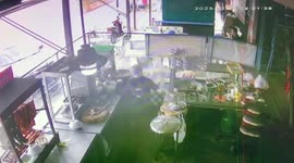 Detached truck wheel flies into roadside restaurant in Thailand