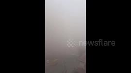 India: Dense Fog Engulfs Delhi And Surrounding States Causing Low Visibility