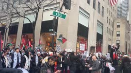 Pro Palestine supporters protest to Cancel Christmas in New York, USA