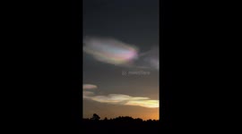 These rainbow clouds look like a colorful portal to another dimension