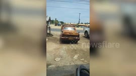 Incredibly skilled worker handcrafts functional wooden car