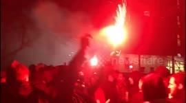 Hearts fans chanting with a let off flare before Edinburgh Derby against Hibernian FC. Easter road
