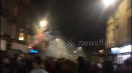 Hearts fans chanting and setting off fireworks before Edinburgh Derby against Hibernian FC. Easter road