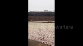 US: Rain Turns Into Snow Amid Slow Moving Storm In St. Louis, Missouri