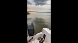 Truck Follows Boat Into Water